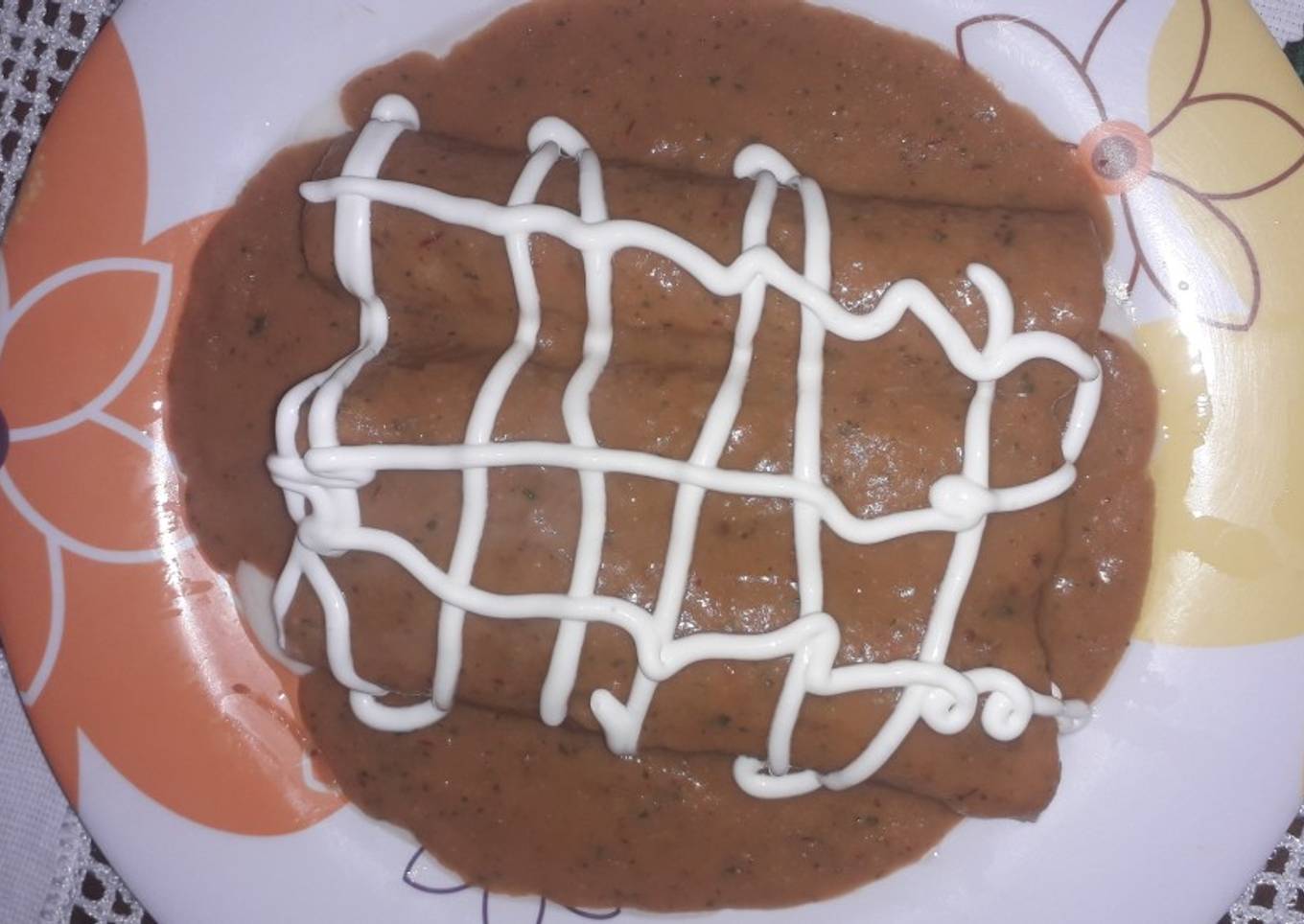 Enfrijoladas de jamón y queso