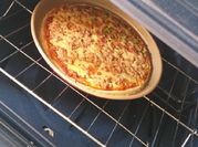 Una foto de parmesano salsa de tomate