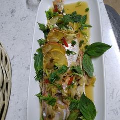 A picture of Baked fish with sticky sauce.