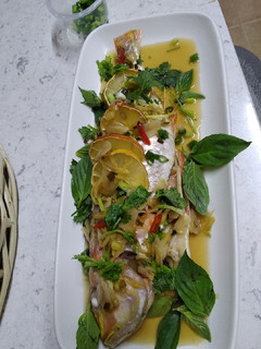 A picture of Baked fish with sticky sauce.