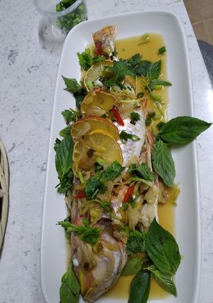 A picture of Baked fish with sticky sauce.