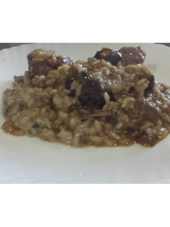 Una foto de Risotto de Carrilleras al Oporto Con parmensano