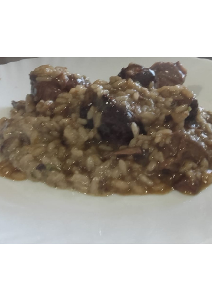 Una foto de Risotto de Carrilleras al Oporto Con parmensano