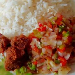 A picture of White rice and fried veggies.