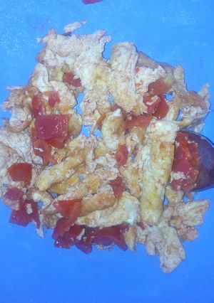 A picture of Fried eggs/ scrambled eggs.