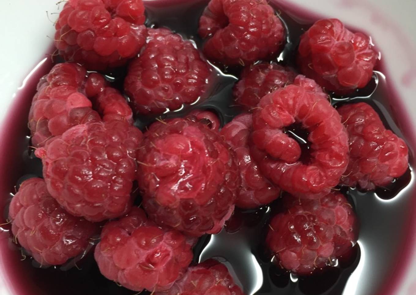 Raspberries with red wine