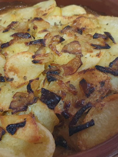 Una foto de Patatas con nata y champiñones