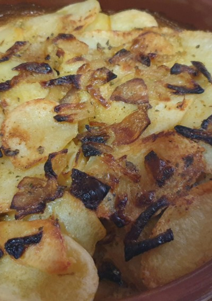 Una foto de Patatas con nata y champiñones