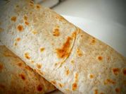 Una foto de rellenos para burritos con carne