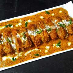 A picture of Resturent Style Malai KoftaCurry.