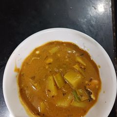 A picture of Creamy Banana stem curry.