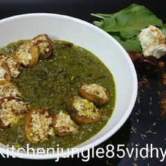 A picture of Stuffed Italian spiced potato in spinach.