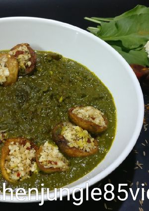 A picture of Stuffed Italian spiced potato in spinach.