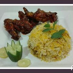 A picture of BBQ Chicken Wings with Masala Rice.