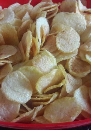 A picture of Home made potato crisps.
