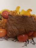 Seared skirt steak over spiced lentils