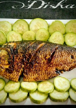 A picture of Stuffed and roasted Hilsa.