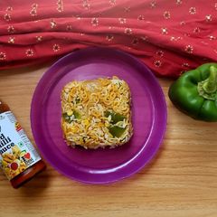 A picture of Veg fried noodles rice.