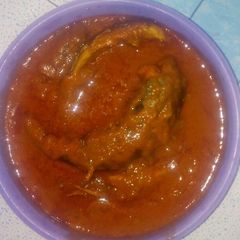 Smoked mackerel curry stew with scent leaf A picture of Smoked mackerel curry stew with scent leaf.