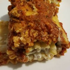 A picture of Italian Sausage Lasagna Roll-Ups.