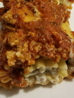 A picture of Italian Sausage Lasagna Roll-Ups.