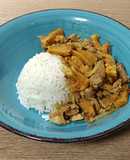 Wok de lomo de cerdo con piña en salsa de cítricos al achiote