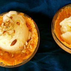 A picture of Carrot puding with vanila icecream.