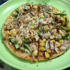 A picture of Cheese corn pizza.