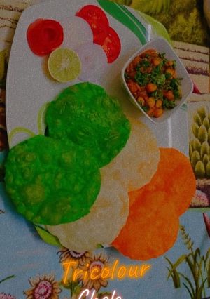 A picture of Tricolor chole Bhature.