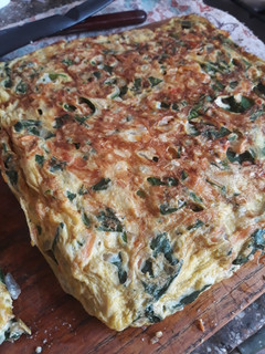 Una foto de Tortilla de verduras en la flip