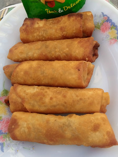 A picture of Spring rolls with leftover mixed vegetables.