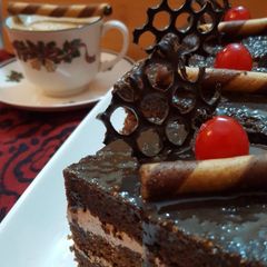Chocolate Pastry with Ceremal/ Chocolate Ganache Frosting A picture of Chocolate Pastry with Ceremal/ Chocolate Ganache Frosting.