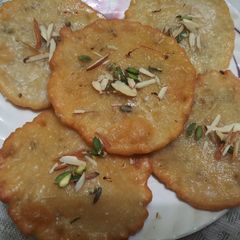 A picture of Malpua with milk powder.