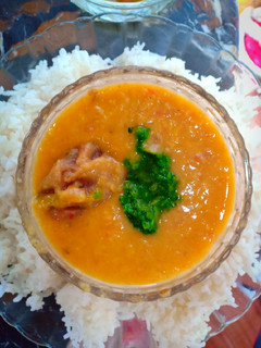 A picture of Daal with simple rice.