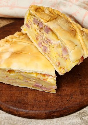 Una foto de 🥧Tarta de jamón, panceta y muzzarella 🥧