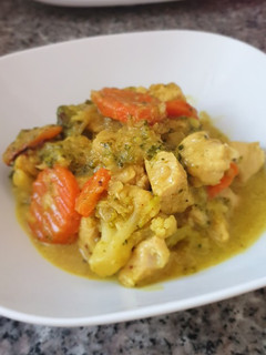 Una foto de Pavo con salsa de coco y curry