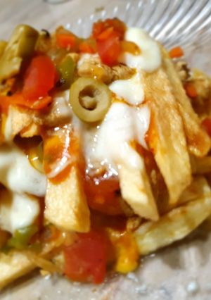 A picture of Fries cottage with cheese.
