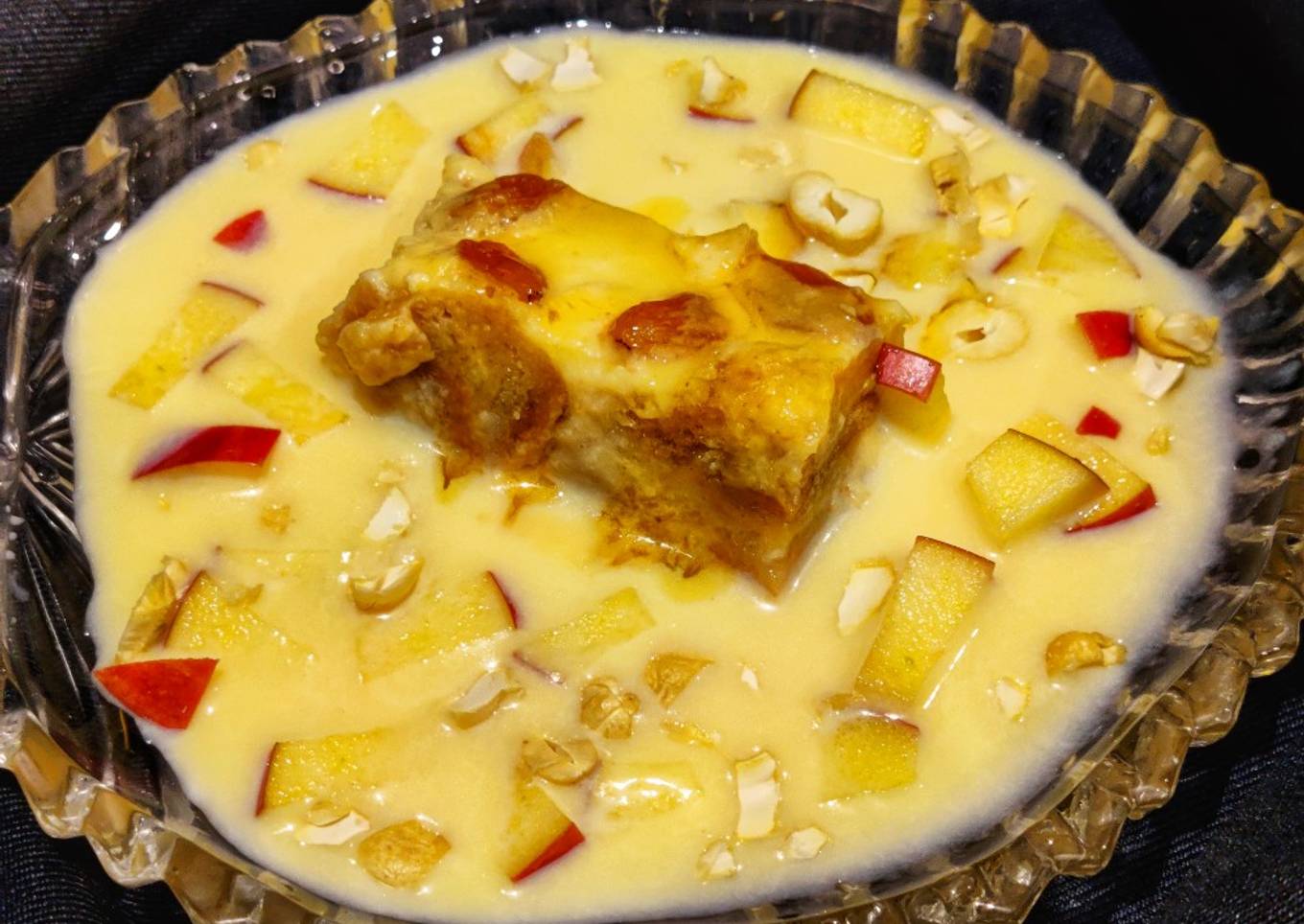 Eggless Bread pudding with vanilla custard sauce