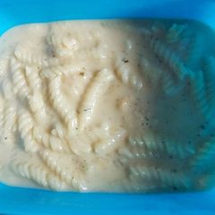 A picture of White sauce cheesy pasta.