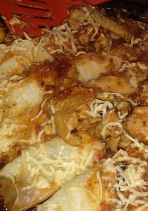 Una foto de Canelones con salsa de 🍗