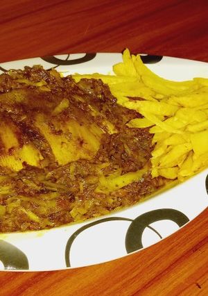 A picture of Grilled fish with fried Irish.