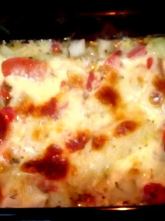 Una foto de Papas Gratinadas y con Tomate