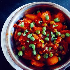 A picture of Healthy tasty masaledar green peas and potato sabji.