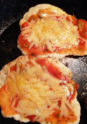 Una foto de Pizza al sartén