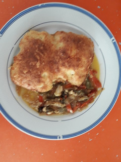 Una foto de Bacalao gratinado