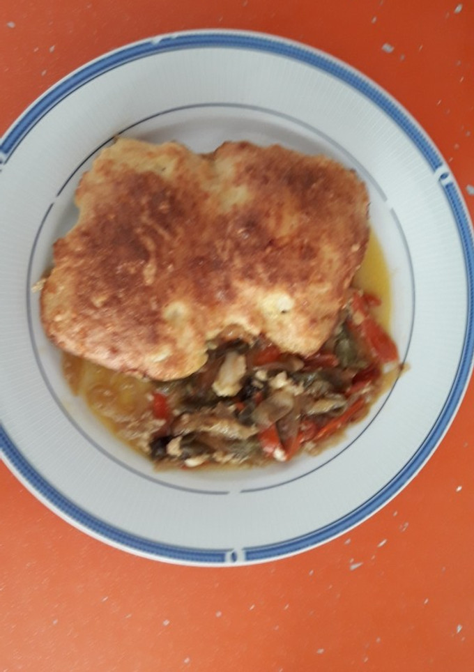 Una foto de Bacalao gratinado