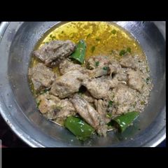 A picture of Hare masali ki chicken.