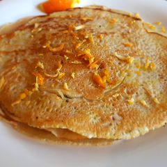 A picture of Pancakes with orange zest.
