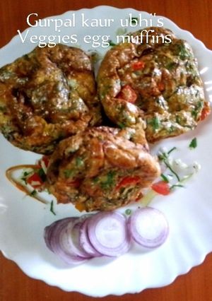 A picture of Veggies egg muffins 🥬🍅🥕🧅.