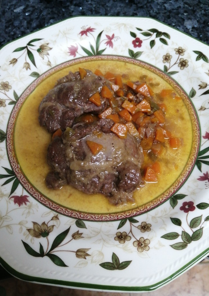 Una foto de Carrilladas de cerdo guisadas